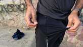 El bolsillo queda en la capa externa del pantaln